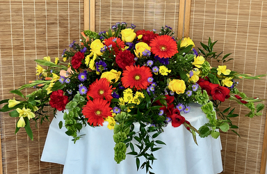 Warm Sentiments Casket Spray from Maplehurst Florist, local flower shop in Essex Junction Warm Sentiments Casket Spray from Maplehurst Florist, local flower shop in Essex Junction