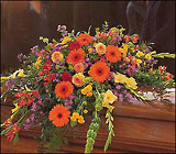 Warm Sentiments Casket Spray from Maplehurst Florist, local flower shop in Essex Junction